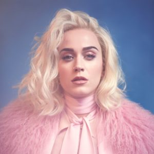 KATY PERRY ADMITS TO MORE THAN KISSING A GIRL